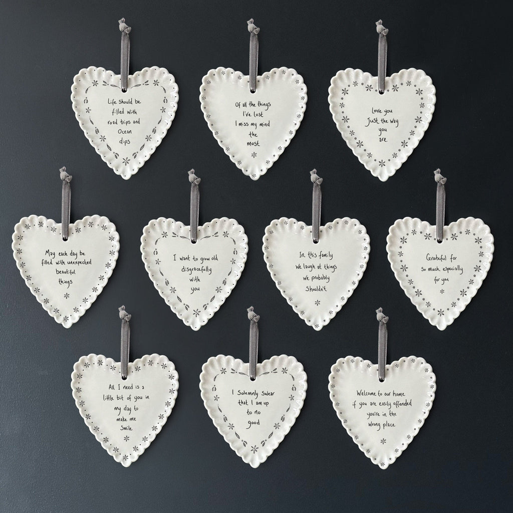 East of India Scallop Heart - In this family we laugh Hanging Decoration East of India Scallop Heart - In this family we laugh